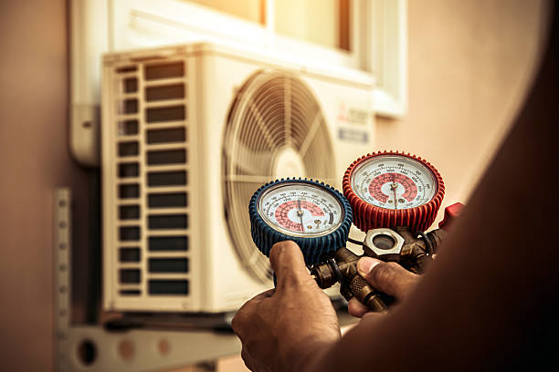Professional Heat Pump Repair technician working in Denver, IN